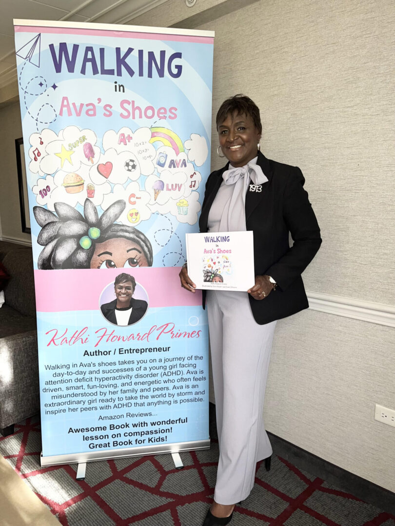 The author standing in front of Walking in Ava's Shoes poster